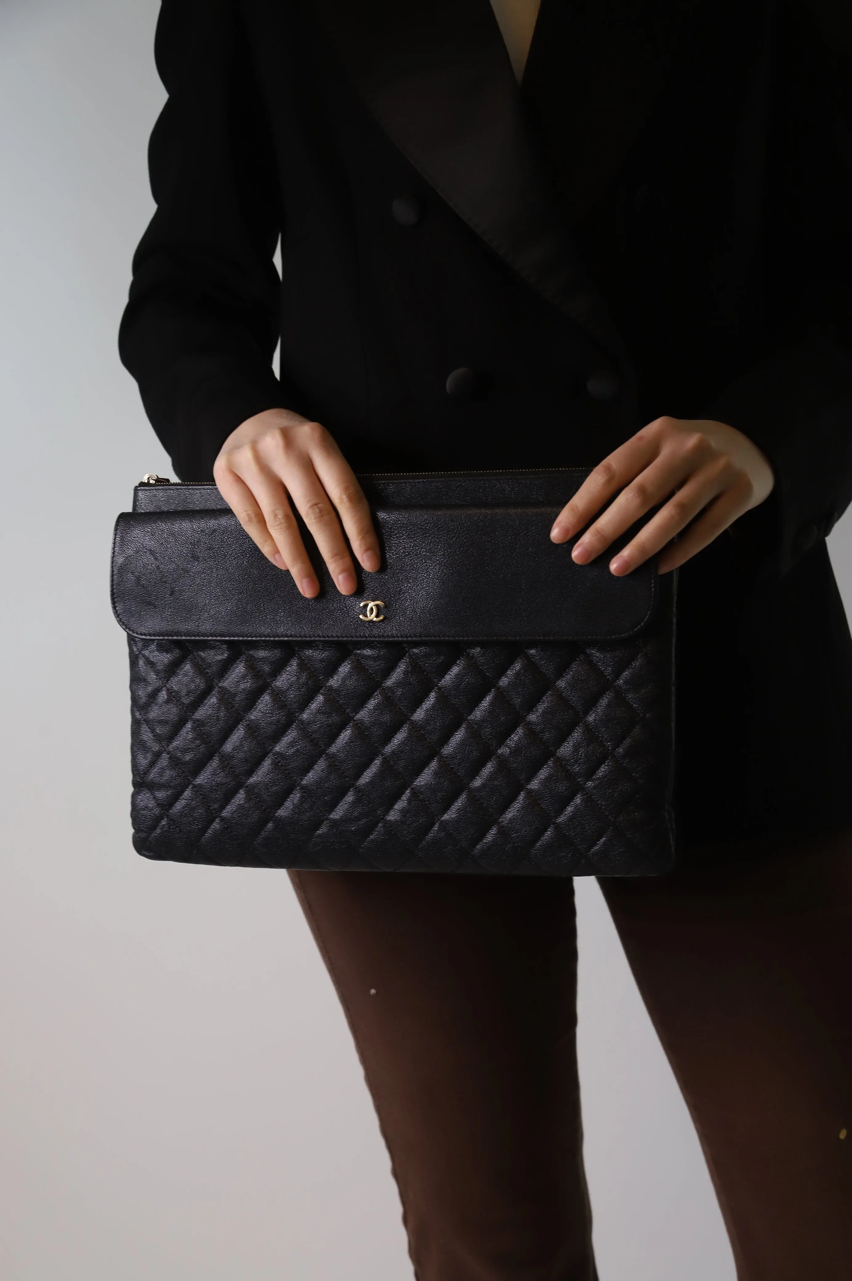 Black 2019 quilted caviar leather clutch bag