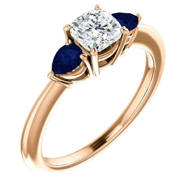 Tressa- Three Stone Engagement Ring, Prong set Cushion Moissanite & Pear Blue Sapphire Accents