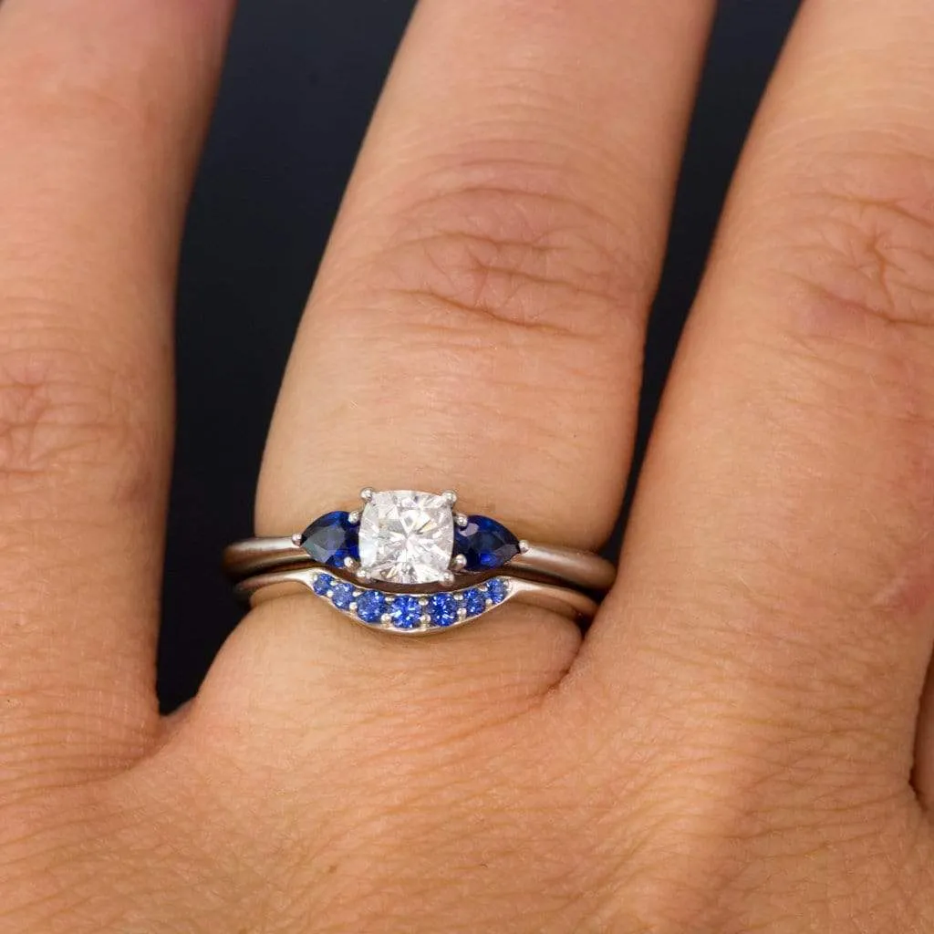 Tressa- Three Stone Engagement Ring, Prong set Cushion Moissanite & Pear Blue Sapphire Accents