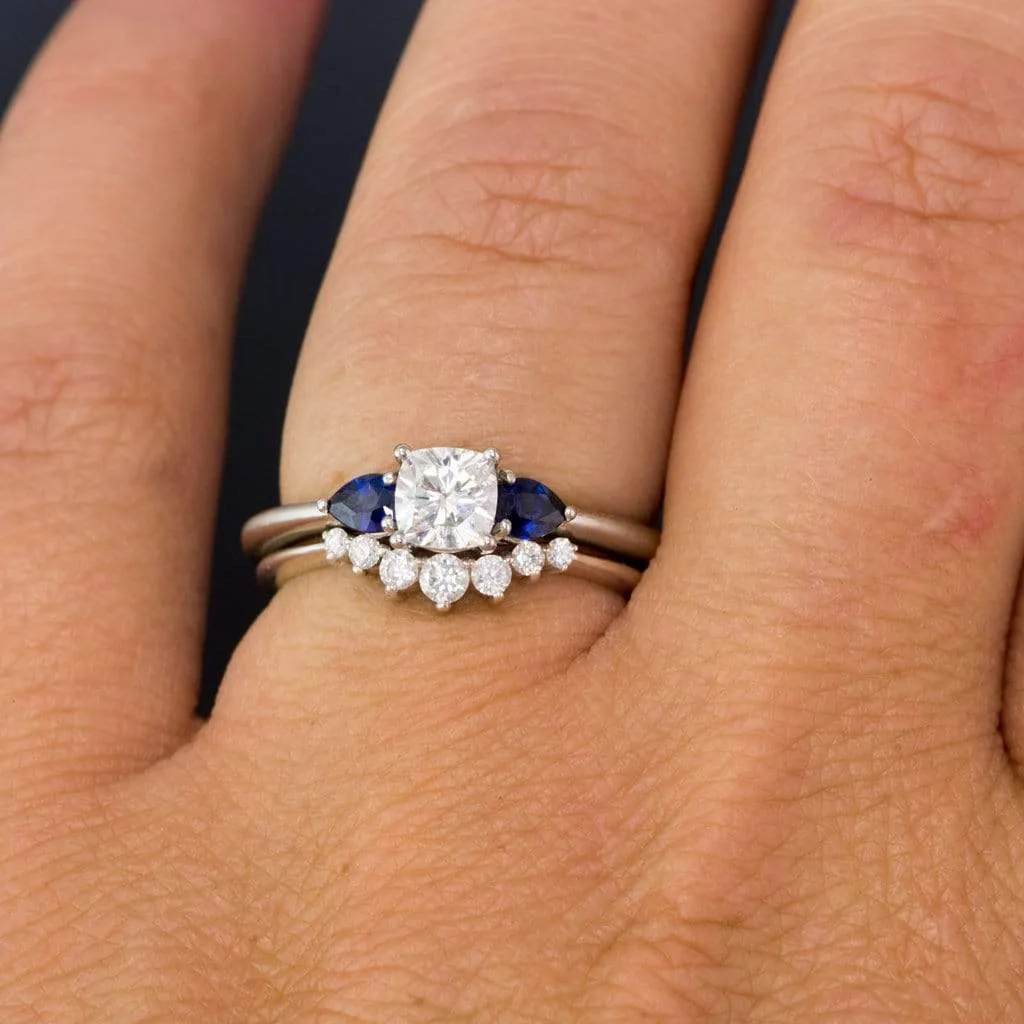 Tressa- Three Stone Engagement Ring, Prong set Cushion Moissanite & Pear Blue Sapphire Accents