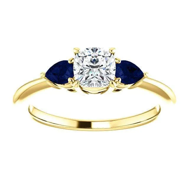 Tressa- Three Stone Engagement Ring, Prong set Cushion Moissanite & Pear Blue Sapphire Accents